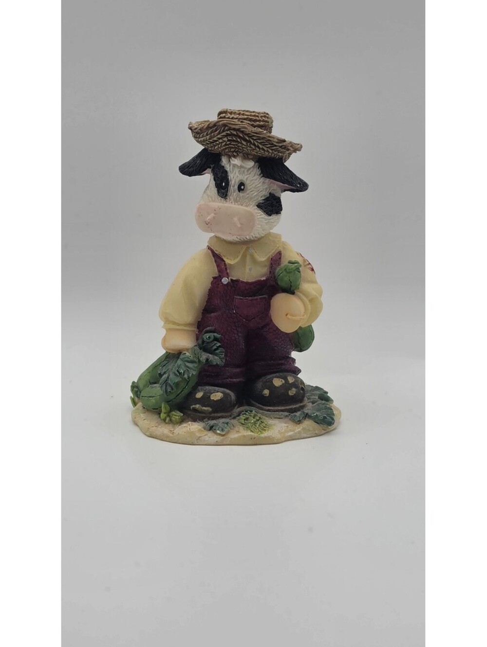 1990s Mary's Moo Moos or Ganz Cowtown "farmer cow" character.